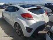 ✅ 2013 Hyundai Veloster Turbo • VIN: KMHTC6AEXDU177666 • Lot: 76932964. Wystawiony na Copart z przebiegiem 109 593 mil. Bezpłatny archiwum sprzedaży aukcyjnych z USA i szczegółowy raport historii pojazdu na DreamBid. Zdjęcie 2.