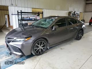 ✅ 2021 Toyota Camry Hybrid SE • VIN: 4T1S31AK9MU569137 • Lot: 70110385. Listed on Copart with 84,554 mi. Free auction sales archive from the USA and detailed vehicle history report at DreamBid. Image 1.