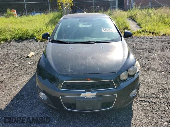 2015 Chevrolet Sonic LT с VIN 1G1JC5SG1F4131564, выставлен на аукционе Copart как лот 68515334 с пробегом 122 754 миль миль и Списание • Salvage title. История ставок и продаж доступна на DreamBid. Изображение 5.