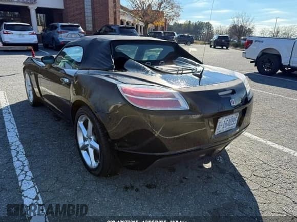✅ 2008 Saturn Sky • VIN: 1G8MB35B28Y112393 • Lot: 43877315. Listed on IAAI with 198,499 mi. Free auction sales archive from the USA and detailed vehicle history report at DreamBid. Image 4.