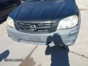 ✅ 2006 Mazda Tribute i • VIN: 4F2YZ02Z26KM33417 • Lot: 43576631. Wystawiony na IAAI z przebiegiem 154 241 mil. Bezpłatny archiwum sprzedaży aukcyjnych z USA i szczegółowy raport historii pojazdu na DreamBid. Zdjęcie 6.