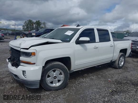 2017 Chevrolet Silverado 1500 LT with VIN 3GCUKREC8HG226281, listed as a IAAI auction lot 40446531 with 117,634 mi miles and . Bid and sale history available at DreamBid. Image 2.