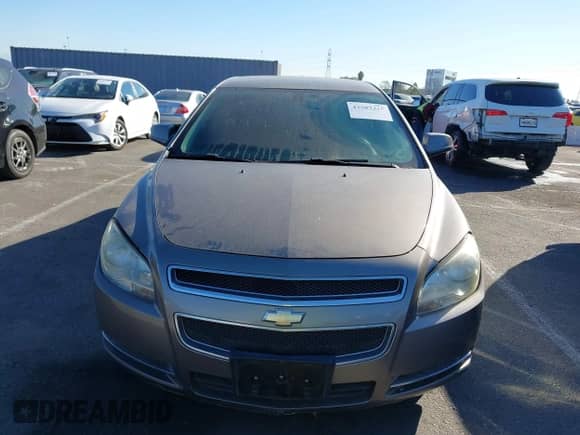 2011 Chevrolet Malibu 1LT z VIN 1G1ZC5E16BF382301, wystawiony jako IAAI lot #43587315 z przebiegiem 199 114 mil mil oraz . Historia ofert i sprzedaży dostępna na DreamBid. Obrazek 6.