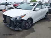 ✅ 2021 Kia Forte LXS • VIN: 3KPF24AD1ME375065 • Lot: 42356572. Listed on IAAI with 83,025 mi. Free auction sales archive from the USA and detailed vehicle history report at DreamBid. Image 2.