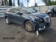 ✅ 2019 Cadillac XT5 FWD • VIN: 1GYKNARSXKZ179614 • Lot: 92675765. Listed on Copart with 72,236 mi. Free auction sales archive from the USA and detailed vehicle history report at DreamBid. Image 4.