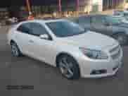 2013 Chevrolet Malibu LTZ with VIN 1G11J5SX5DF223834, listed as a IAAI auction lot 42792315 with 208,506 mi miles and . Bid and sale history available at DreamBid. Image 1.