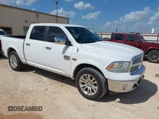 ✅ 2014 Ram 1500 Longhorn • VIN: 1C6RR6PTXES122156 • Lot: 42703793. Listed on IAAI with 160,796 mi. Free auction sales archive from the USA and detailed vehicle history report at DreamBid. Image 1.