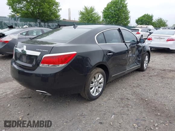 ✅ 2013 Buick LaCrosse • VIN: 1G4GA5E38DF238933 • Lot: 42187349. Listed on IAAI with 103,896 mi. Free auction sales archive from the USA and detailed vehicle history report at DreamBid. Image 4.