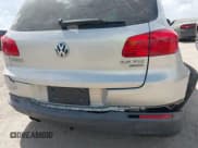 ✅ 2012 Volkswagen Tiguan S • VIN: WVGBV7AX6CW585386 • Lot: 43267607. Listed on IAAI with 91,618 mi. Free auction sales archive from the USA and detailed vehicle history report at DreamBid. Image 13.