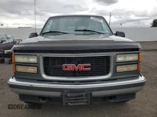 ✅ 1999 GMC Suburban • VIN: 1GKFK16R0XJ772880 • Lot: 46986325. Wystawiony na Copart z przebiegiem 237 921 mil. Bezpłatny archiwum sprzedaży aukcyjnych z USA i szczegółowy raport historii pojazdu na DreamBid. Zdjęcie 5.