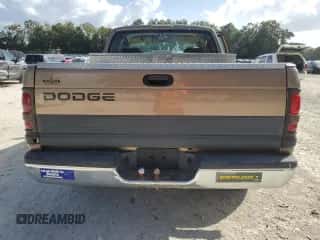 2000 Dodge 1500 с VIN 1B7HC13Y4YJ124957, выставлен на аукционе Copart как лот 76333354 с пробегом 390 462 миль миль и Списание • Salvage title. История ставок и продаж доступна на DreamBid. Изображение 6.