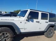 ✅ 2017 Jeep Wrangler Unlimited Rubicon • VIN: 1C4BJWFG3HL597572 • Lot: 40877947. Wystawiony na IAAI z przebiegiem 162 923 mil. Bezpłatny archiwum sprzedaży aukcyjnych z USA i szczegółowy raport historii pojazdu na DreamBid. Zdjęcie 14.