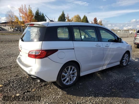 ✅ 2013 Mazda 5 Grand Touring • VIN: JM1CW2DL1D0153651 • Лот: 85403955. Опубликован ранее на Copart с пробегом 54 275 миль. Бесплатный доступ к архиву аукционных продаж из США и подробный отчёт об истории автомобиля на DreamBid. Изображение 3.