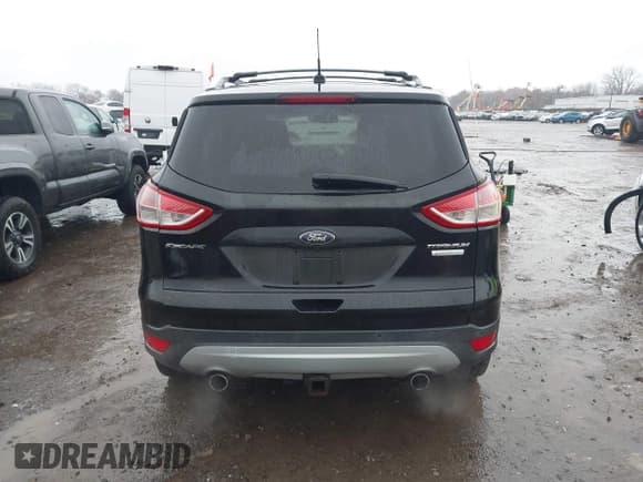 ✅ 2013 Ford Escape Titanium • VIN: 1FMCU0J90DUA76892 • Lot: 43769603. Listed on IAAI with 129,881 mi. Free auction sales archive from the USA and detailed vehicle history report at DreamBid. Image 16.