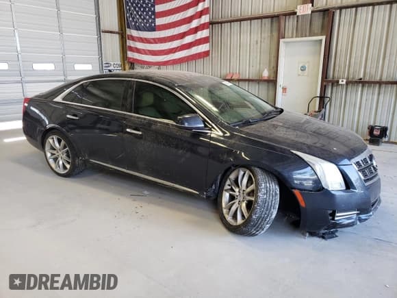 ✅ 2014 Cadillac XTS Premium • VIN: 2G61V5S85E9243938 • Лот: 66424964. Опубликован ранее на Copart с пробегом 164 062 миль. Бесплатный доступ к архиву аукционных продаж из США и подробный отчёт об истории автомобиля на DreamBid. Изображение 4.