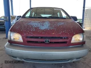 ✅ 1999 Toyota Sienna LE • VIN: 4T3ZF13C2XU123810 • Lot: 73245874. Listed on Copart with 219,762 mi. Free auction sales archive from the USA and detailed vehicle history report at DreamBid. Image 5.