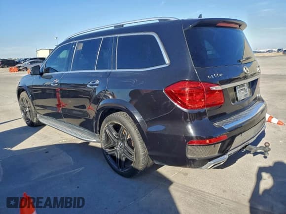 ✅ 2014 Mercedes-Benz GL 550 • VIN: 4JGDF7DE5EA350171 • Lot: 92241225. Listed on Copart with 115,625 mi. Free auction sales archive from the USA and detailed vehicle history report at DreamBid. Image 2.