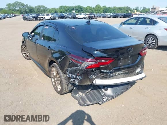 2023 Toyota Camry SE with VIN 4T1G11BKXPU097643, listed as a IAAI auction lot 42833306 with 23,580 mi miles and . Bid and sale history available at DreamBid. Image 17.