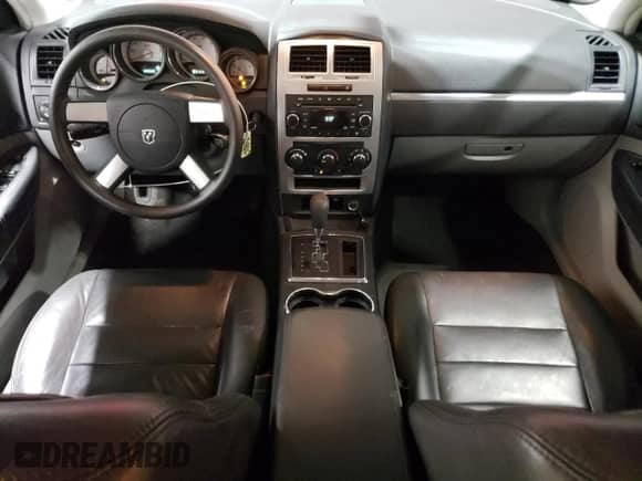 2009 Dodge Charger SXT с VIN 2B3KA33V39H514918, выставлен на аукционе Copart как лот 78243114 с пробегом 122 520 миль миль и Списание • Salvage title. История ставок и продаж доступна на DreamBid. Изображение 8.