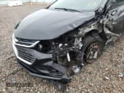 ✅ 2018 Chevrolet Cruze LS • VIN: 1G1BC5SM2J7235479 • Lot: 50653202. Listed on Copart with 90,188 mi. Free auction sales archive from the USA and detailed vehicle history report at DreamBid. Image 9.