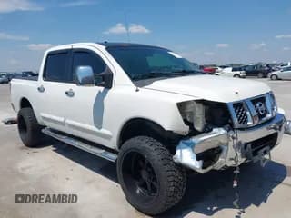 ✅ 2005 Nissan Titan LE • VIN: 1N6BA07A45N527423 • Lot: 43059455. Listed on IAAI with 134,021 mi. Free auction sales archive from the USA and detailed vehicle history report at DreamBid. Image 1.