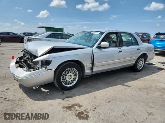✅ 2002 Mercury Grand Marquis GS • VIN: 2MEFM74W42X631407 • Lot: 66869645. Wystawiony na Copart z przebiegiem 104 779 mil. Bezpłatny archiwum sprzedaży aukcyjnych z USA i szczegółowy raport historii pojazdu na DreamBid. Zdjęcie 1.