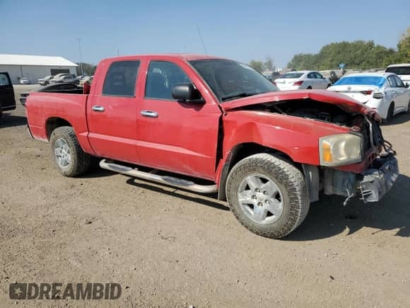 2005 Dodge Dakota SLT with VIN 1D7HW48N15S273409, listed as a Copart auction lot 84817255 with Not provided miles and Salvage title. Bid and sale history available at DreamBid. Image 4.