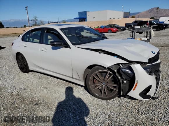 ✅ 2023 BMW 3 Series 330i • VIN: 3MW69FF00P8D03089 • Lot: 89451965. Listed on Copart with 32,312 mi. Free auction sales archive from the USA and detailed vehicle history report at DreamBid. Image 4.