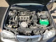 ✅ 2001 Mazda 626 LX • VIN: 1YVGF22C715200453 • Lot: 84706015. Wystawiony na Copart z przebiegiem 63 514 mil. Bezpłatny archiwum sprzedaży aukcyjnych z USA i szczegółowy raport historii pojazdu na DreamBid. Zdjęcie 11.