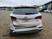 ✅ 2017 Hyundai Santa Fe 2.4L • VIN: 5XYZTDLB3HG403396 • Lot: 90454515. Listed on Copart with 143,486 mi. Free auction sales archive from the USA and detailed vehicle history report at DreamBid. Image 6.