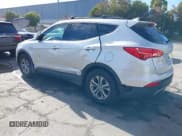 ✅ 2014 Hyundai Santa Fe • VIN: 5XYZU3LB7EG205102 • Lot: 43657537. Wystawiony na IAAI z przebiegiem 142 689 mil. Bezpłatny archiwum sprzedaży aukcyjnych z USA i szczegółowy raport historii pojazdu na DreamBid. Zdjęcie 3.
