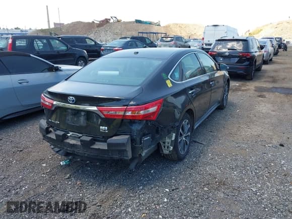 ✅ 2018 Toyota Avalon Hybrid XLE Plus • VIN: 4T1BD1EB2JU062373 • Lot: 42582772. Listed on IAAI with 136,053 mi. Free auction sales archive from the USA and detailed vehicle history report at DreamBid. Image 4.
