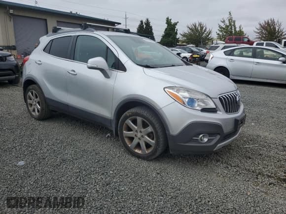 ✅ 2014 Buick Encore Premium • VIN: KL4CJHSB1EB711820 • Лот: 80312805. Опубликован ранее на Copart с пробегом 148 021 миль. Бесплатный доступ к архиву аукционных продаж из США и подробный отчёт об истории автомобиля на DreamBid. Изображение 4.