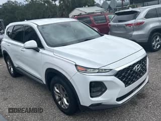 ✅ 2019 Hyundai Santa Fe SEL • VIN: 5NMS33AD0KH053559 • Lot: 84977185. Listed on Copart with 129,077 mi. Free auction sales archive from the USA and detailed vehicle history report at DreamBid. Image 1.