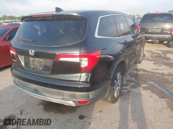 ✅ 2019 Honda Pilot EX-L • VIN: 5FNYF5H58KB043892 • Lot: 42431694. Listed on IAAI with 61,404 mi. Free auction sales archive from the USA and detailed vehicle history report at DreamBid. Image 4.