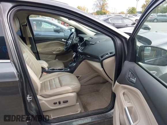 ✅ 2015 Ford Escape Titanium • VIN: 1FMCU0JX8FUB71346 • Lot: 43558511. Listed on IAAI with 127,729 mi. Free auction sales archive from the USA and detailed vehicle history report at DreamBid. Image 5.