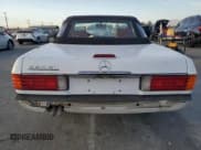 ✅ 1989 Mercedes-Benz 560 SL • VIN: WDBBA48D7KA100290 • Lot: 85049924. Listed on Copart with 88,919 mi. Free auction sales archive from the USA and detailed vehicle history report at DreamBid. Image 6.