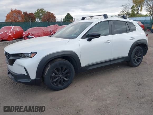✅ 2023 Mazda CX-50 S Preferred Plus • VIN: 7MMVABCM3PN133636 • Lot: 43424123. Listed on IAAI with 28,546 mi. Free auction sales archive from the USA and detailed vehicle history report at DreamBid. Image 2.