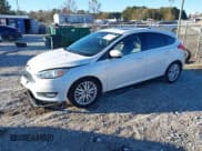 ✅ 2016 Ford Focus Titanium • VIN: 1FADP3N22GL344405 • Lot: 43612764. Listed on IAAI with 60,636 mi. Free auction sales archive from the USA and detailed vehicle history report at DreamBid. Image 2.