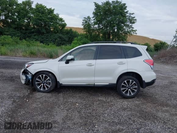 2018 Subaru Forester Touring z VIN JF2SJGWC3JH607000, wystawiony jako IAAI lot #42664722 z przebiegiem 30 857 mil mil oraz . Historia ofert i sprzedaży dostępna na DreamBid. Obrazek 14.