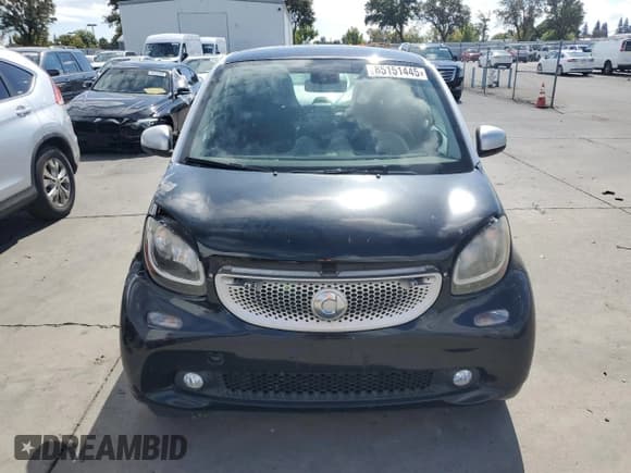 ✅ 2016 Smart fortwo Prime • VIN: WMEFJ5DA3GK073788 • Lot: 85151445. Wystawiony na Copart z przebiegiem 102 443 mil. Bezpłatny archiwum sprzedaży aukcyjnych z USA i szczegółowy raport historii pojazdu na DreamBid. Zdjęcie 5.