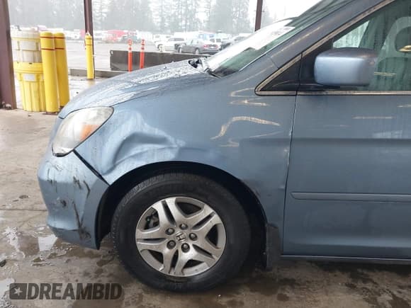 ✅ 2006 Honda Odyssey EX-L • VIN: 5FNRL38616B096000 • Lot: 43805814. Listed on IAAI with 220,813 mi. Free auction sales archive from the USA and detailed vehicle history report at DreamBid. Image 6.