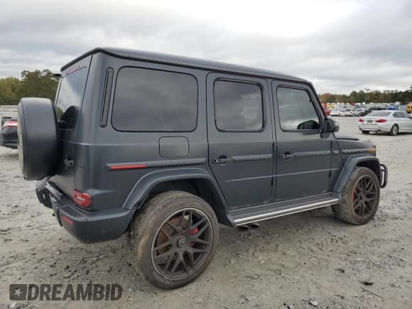 ✅ 2023 Mercedes-Benz G 63 AMG • VIN: W1NYC7HJ5PX470020 • Lot: 87487715. Wystawiony na Copart z przebiegiem 111 984 mil. Bezpłatny archiwum sprzedaży aukcyjnych z USA i szczegółowy raport historii pojazdu na DreamBid. Zdjęcie 3.