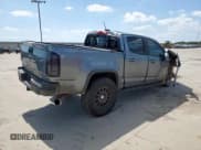 ✅ 2018 Chevrolet Colorado 4WD ZR2 • VIN: 1GCPTEE11J1243686 • Лот: 58235125. Опубликован ранее на Copart с пробегом 144 760 миль. Бесплатный доступ к архиву аукционных продаж из США и подробный отчёт об истории автомобиля на DreamBid. Изображение 3.