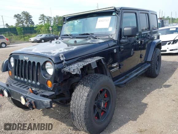 ✅ 2007 Jeep Wrangler Unlimited Sahara • VIN: 1J4GA59187L178391 • Lot: 42422715. Listed on IAAI with 134,256 mi. Free auction sales archive from the USA and detailed vehicle history report at DreamBid. Image 2.