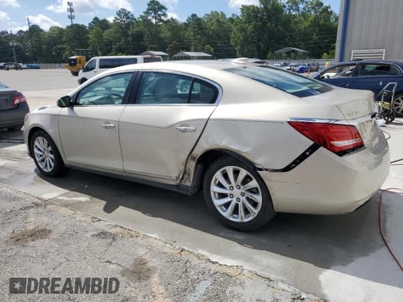 ✅ 2015 Buick LaCrosse • VIN: 1G4GA5G34FF201846 • Lot: 61036345. Listed on Copart with 74,347 mi. Free auction sales archive from the USA and detailed vehicle history report at DreamBid. Image 2.