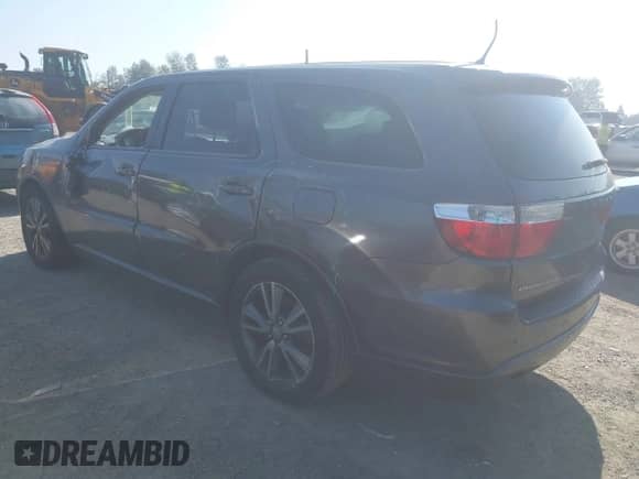 2013 Dodge Durango R/T with VIN 1C4SDHCT3DC687528, listed as a IAAI auction lot 43303576 with 94,220 mi miles and . Bid and sale history available at DreamBid. Image 3.