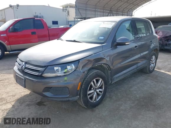✅ 2012 Volkswagen Tiguan LE • VIN: WVGAV7AXXCW004399 • Lot: 42316392. Listed on IAAI with 132,996 mi. Free auction sales archive from the USA and detailed vehicle history report at DreamBid. Image 2.