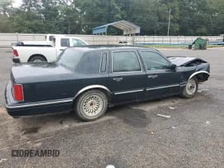 ✅ 1997 Lincoln Town Car Executive • VIN: 1LNLM81W2VY729219 • Lot: 70766054. Listed on Copart with 182,361 mi. Free auction sales archive from the USA and detailed vehicle history report at DreamBid. Image 3.