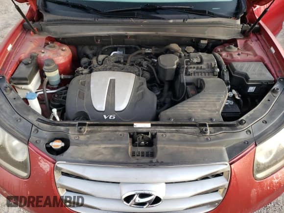 ✅ 2012 Hyundai Santa Fe SE • VIN: 5XYZHDAG9CG108036 • Lot: 75458614. Listed on Copart with 63,718 mi. Free auction sales archive from the USA and detailed vehicle history report at DreamBid. Image 14.